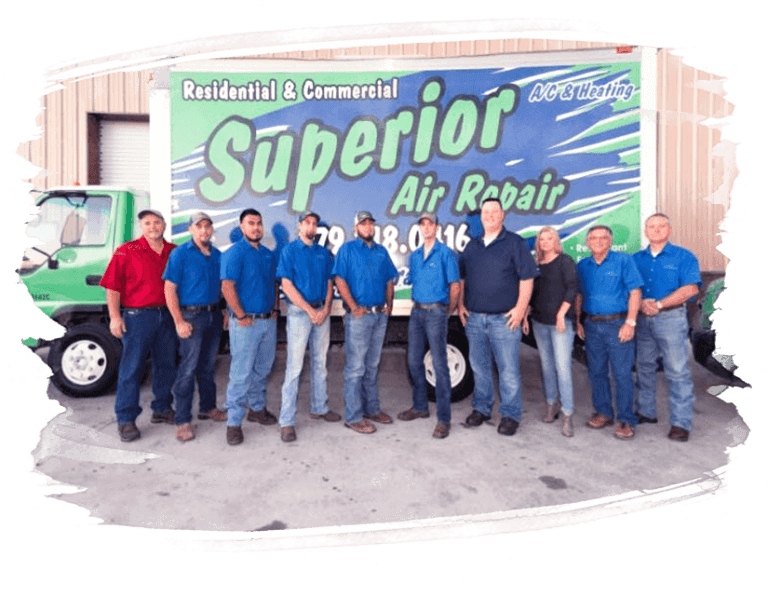 A group of men standing in front of a truck.